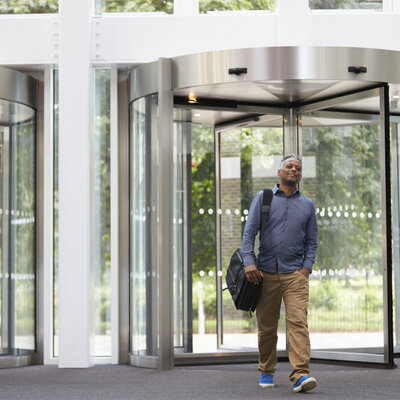 Man entering Kbank building
